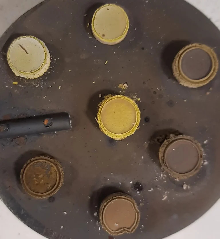 A photo of seven mirror-polished W-based samples after annealing at 1000 °C. 